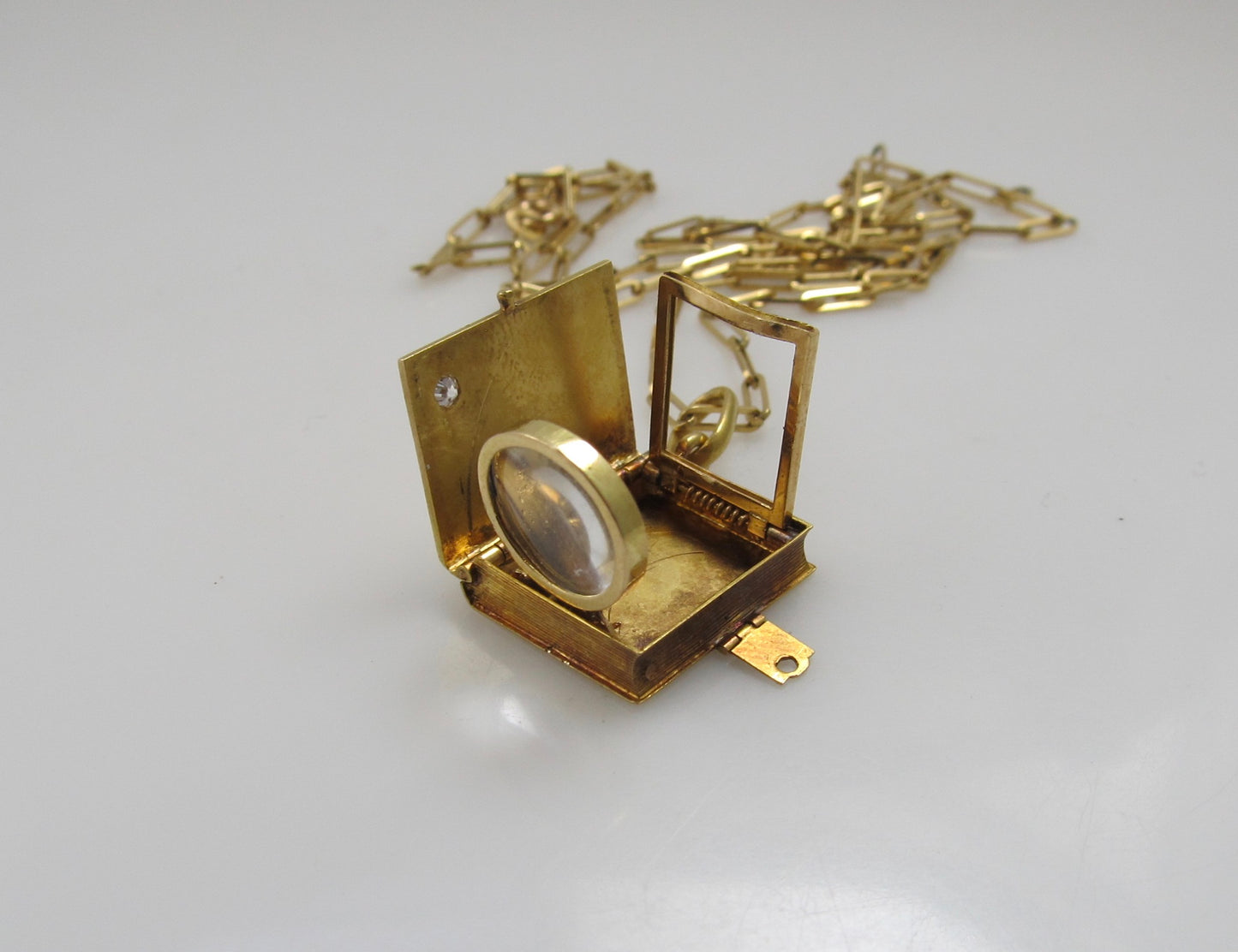 MUST SEE!  Antique locket with a magnifier and picture frame