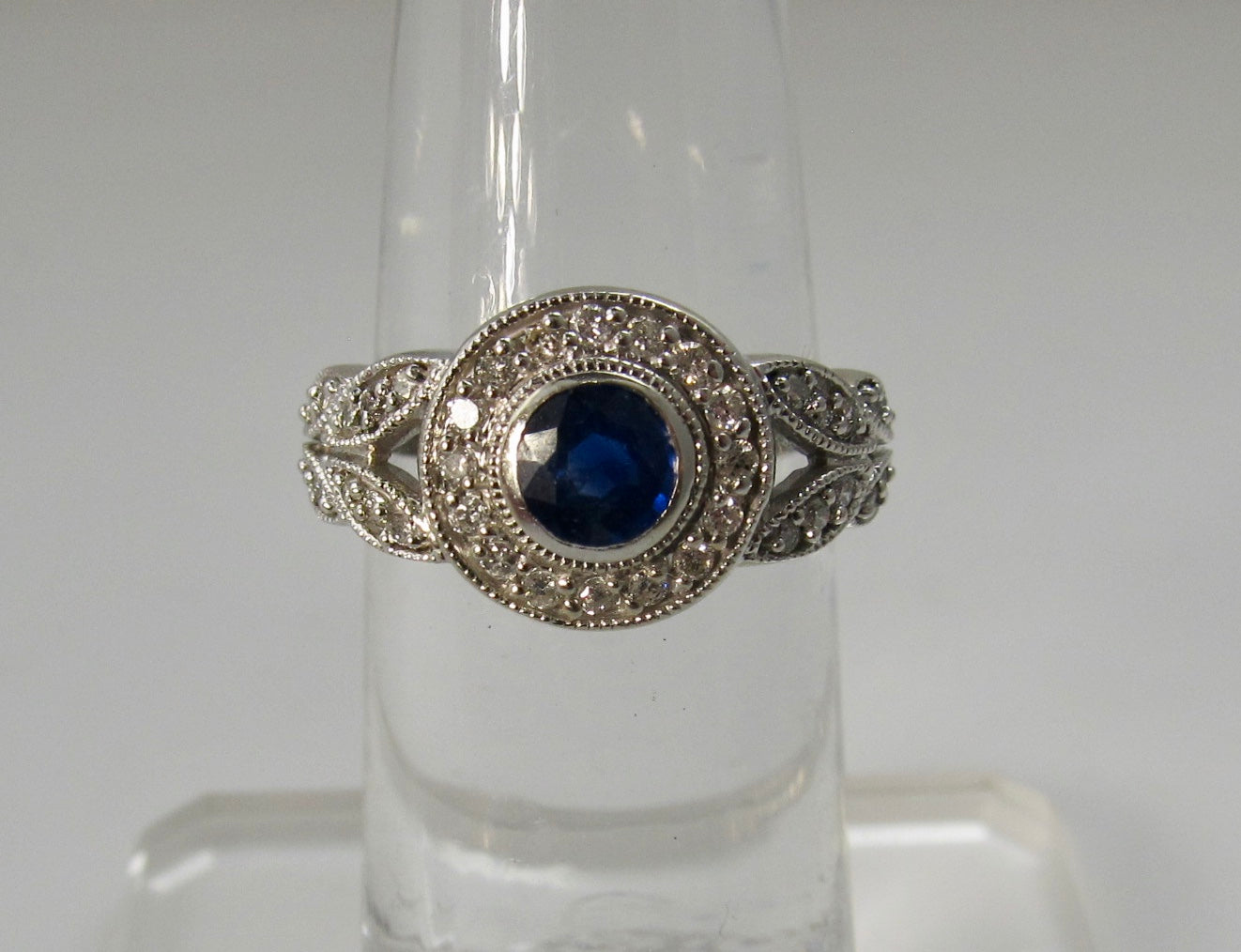 Sapphire and diamond halo ring, 14k white gold