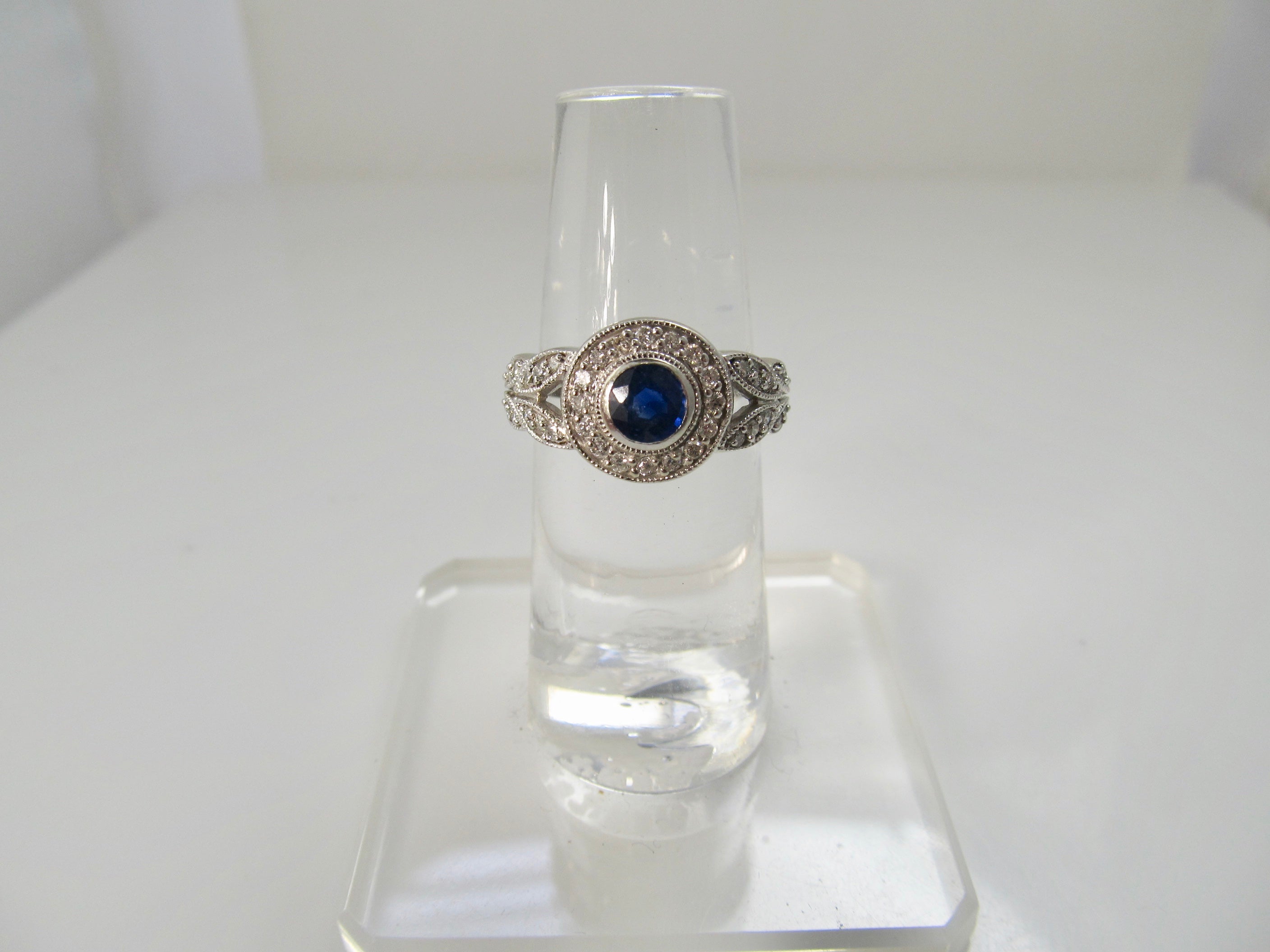 Sapphire and diamond halo ring, 14k white gold