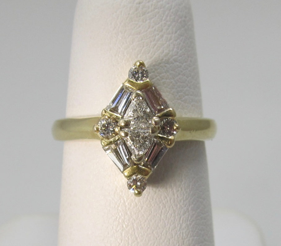 Vintage marquise shaped diamond ring, 14k yellow gold