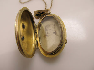 Victorian gold locket with enamel and a pearl