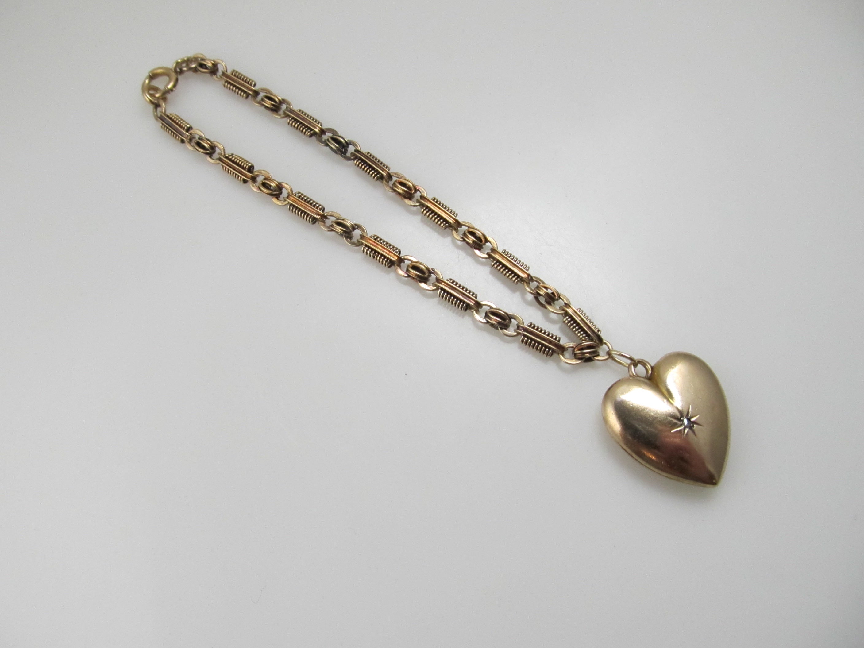 Antique heart locket charm bracelet, 14k