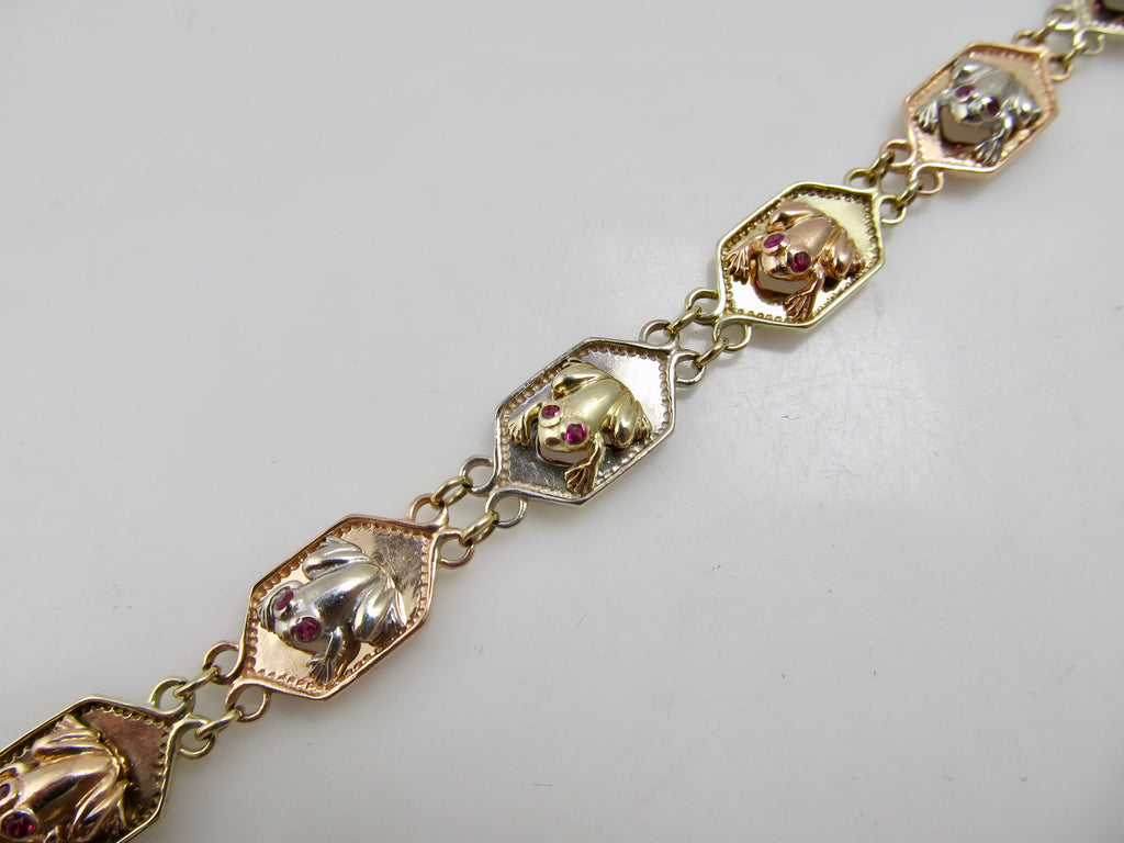 14k white, rose and yellow gold frog bracelet with ruby