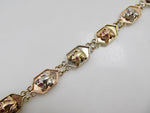14k white, rose and yellow gold frog bracelet with ruby