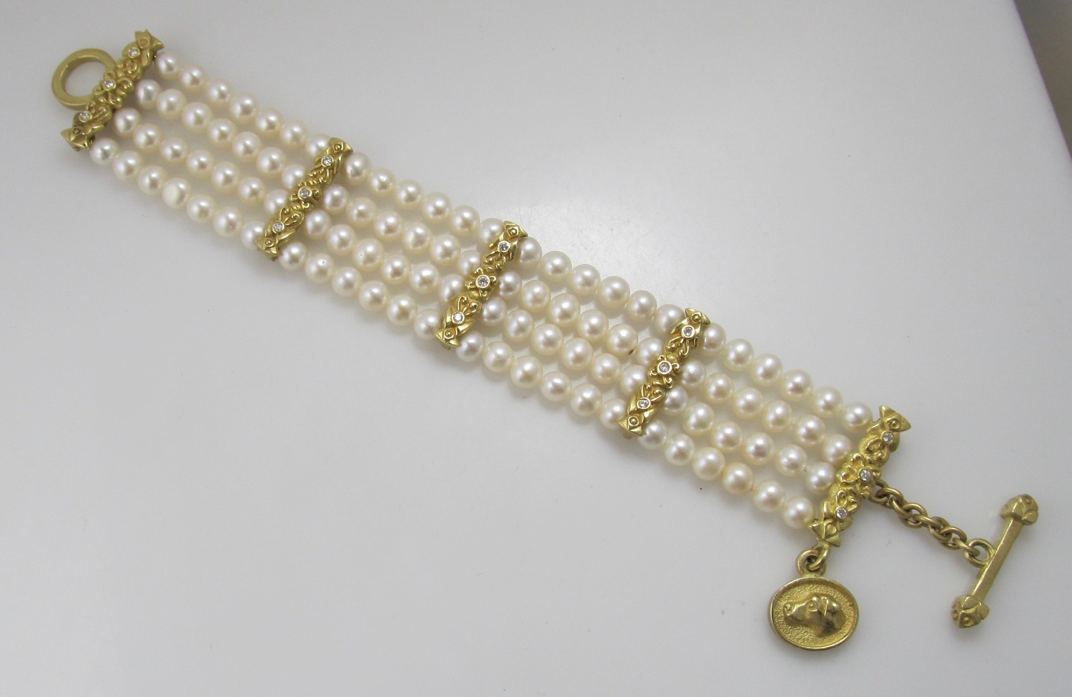 Douglas Elliott 18k diamod pearl bracelet