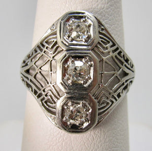 Antique white gold filigree diamond ring