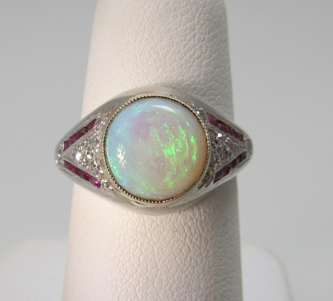 Vintage platinum opal, ruby and diamond ring