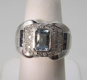 Modern aquamarine, sapphire and diamond ring