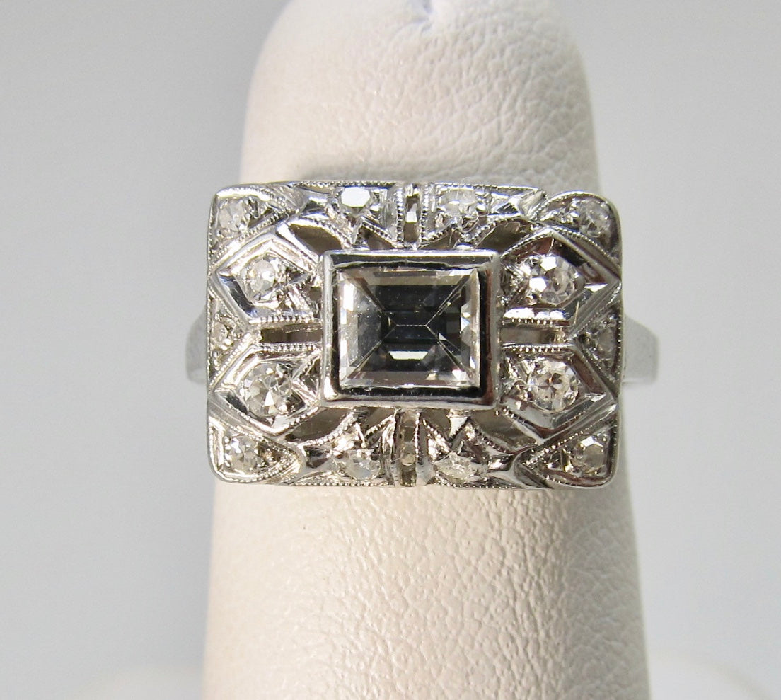 Antique platinum .55ct diamond ring