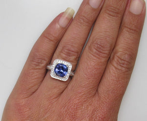 2.75ct tanzanite and diamond halo ring