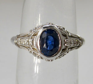 Filigree ring with a sapphire and diamonds