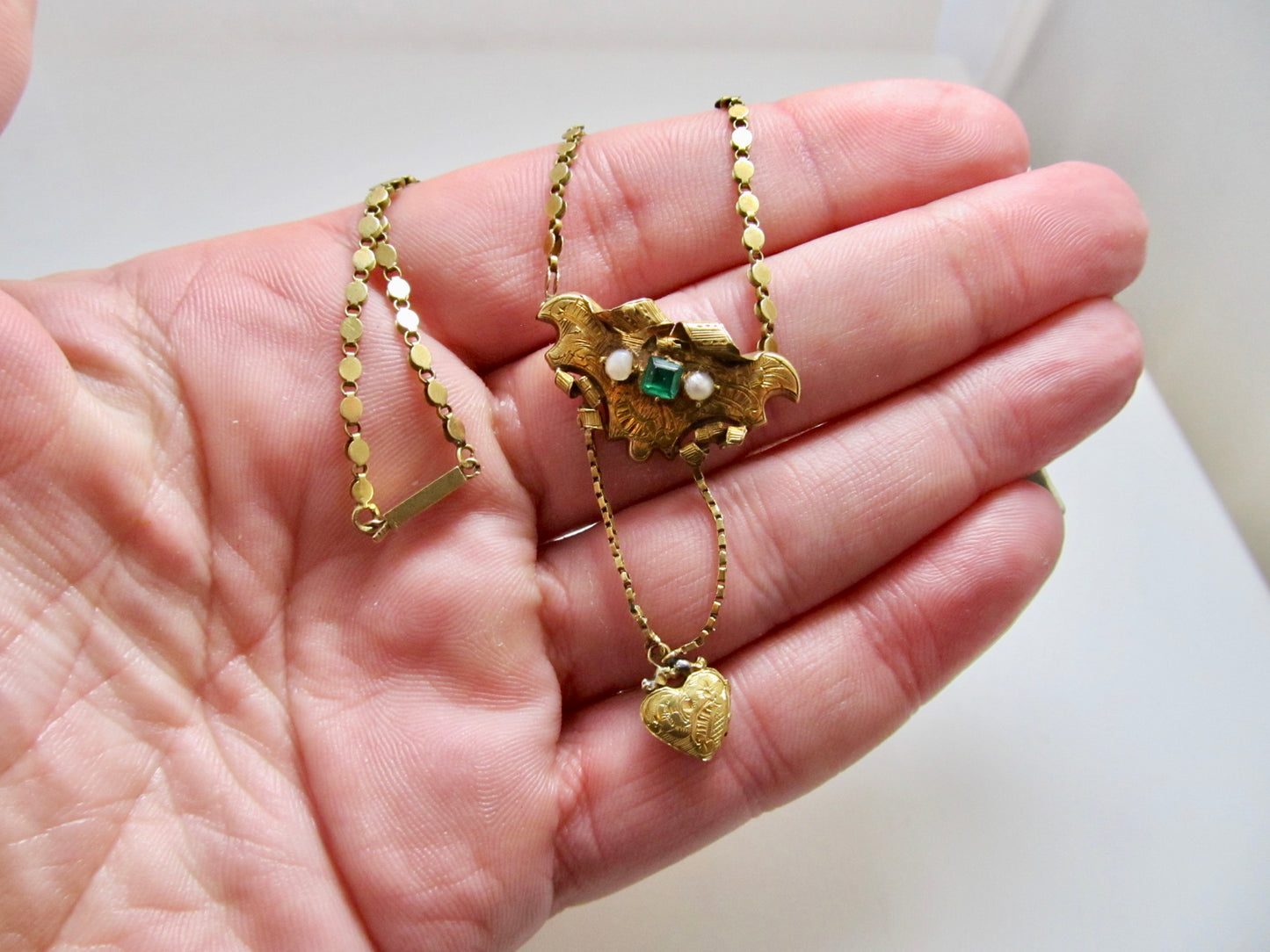 Victorian yellow gold emerald locket necklace