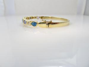 Tanzanite, opal and diamond bangle bracelet