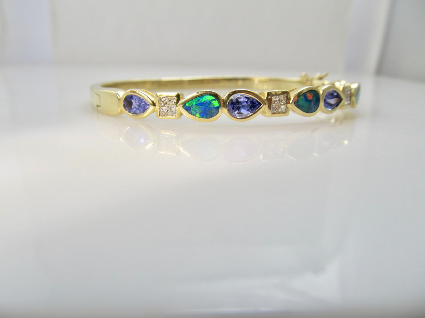Tanzanite, opal and diamond bangle bracelet