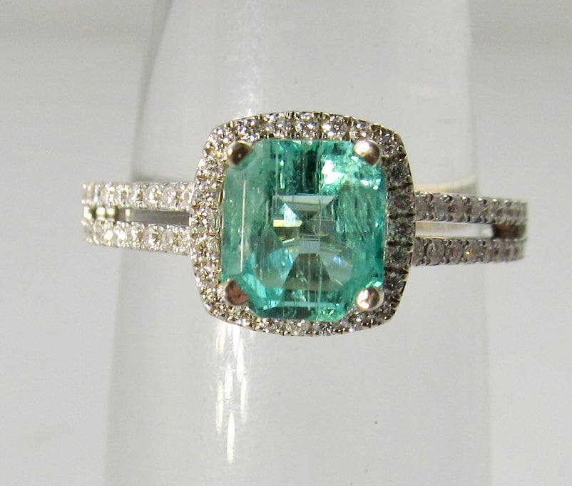 Modern 1.10ct emerald and diamond ring