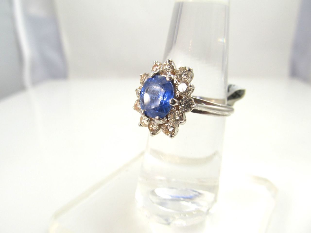 14k white gold ring with a 2ct sapphire and 1.25ct diamond ring.  Diamonds are VS2-SI1, G-H