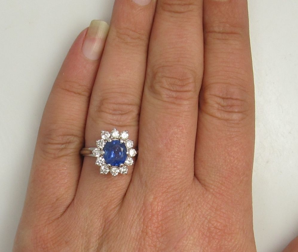 14k white gold ring with a 2ct sapphire and 1.25ct diamond ring.  Diamonds are VS2-SI1, G-H