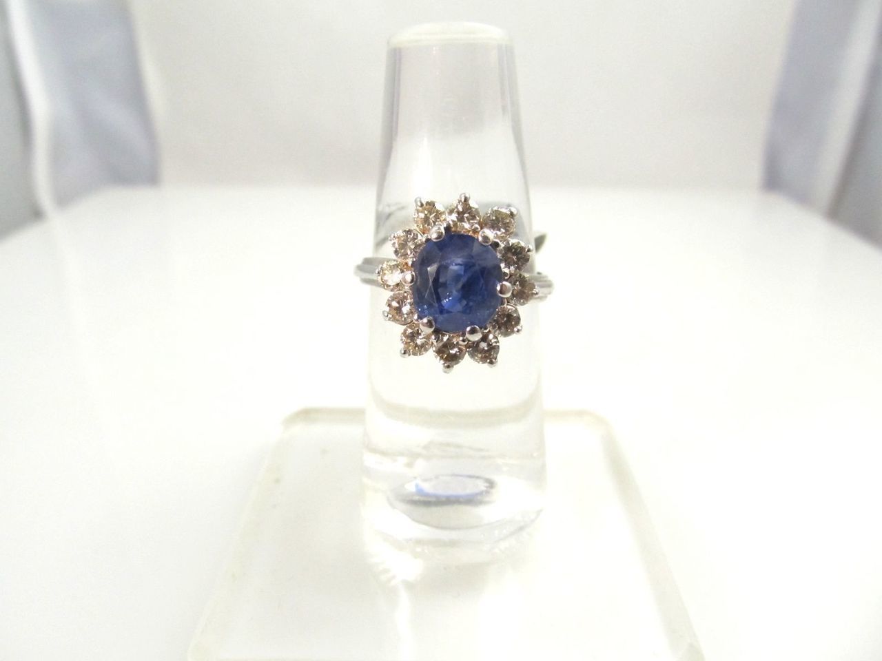 14k white gold ring with a 2ct sapphire and 1.25ct diamond ring.  Diamonds are VS2-SI1, G-H