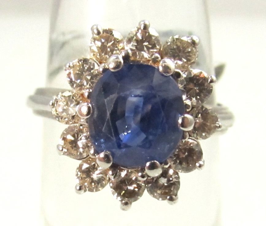 14k white gold ring with a 2ct sapphire and 1.25ct diamond ring.  Diamonds are VS2-SI1, G-H